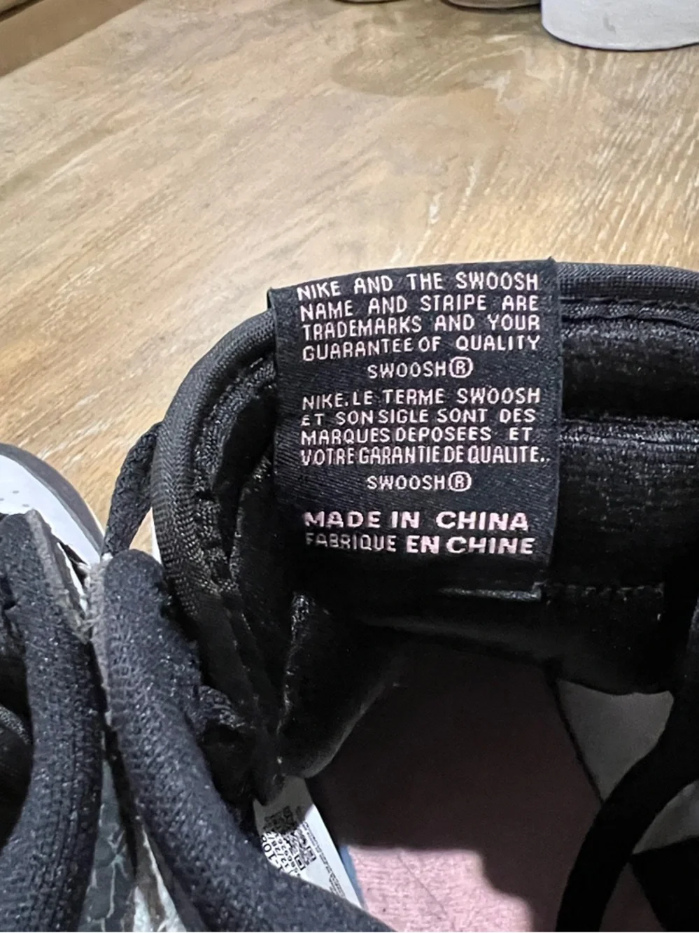 Nike Kids High-Top Sneakers — Black & White with Pink Accent